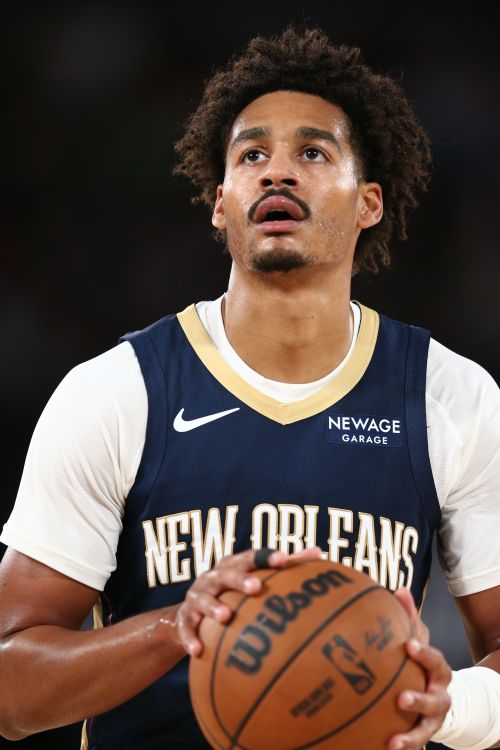 Jordan-Poole-CAA-Basketball-photo-grid